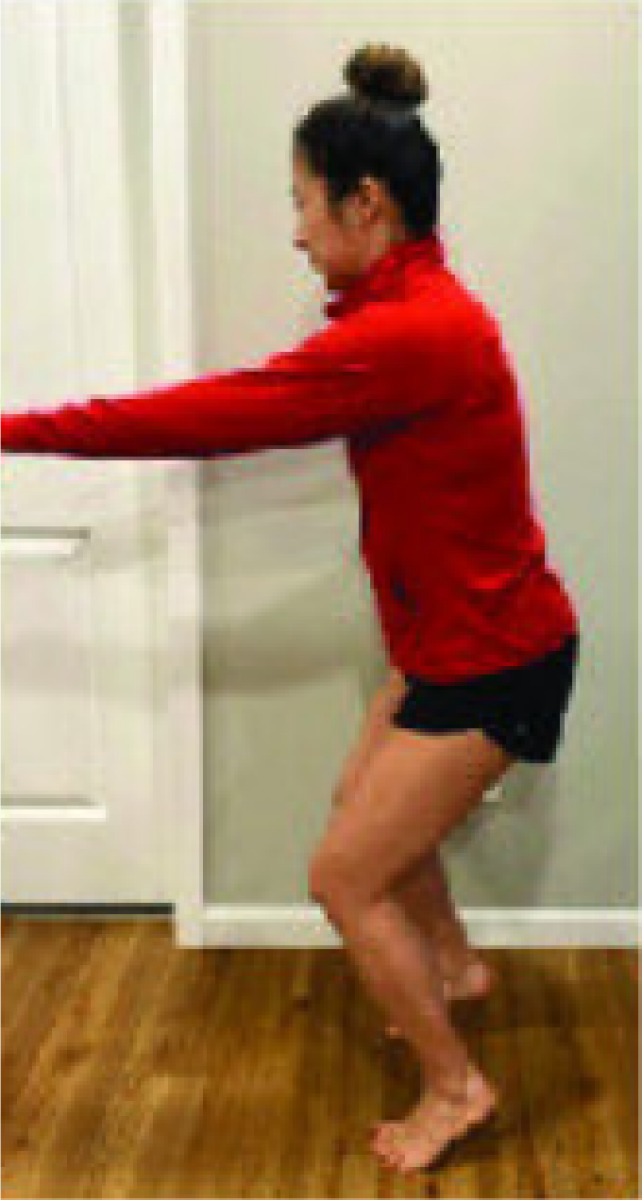 a woman performing a soleus raise exercise
